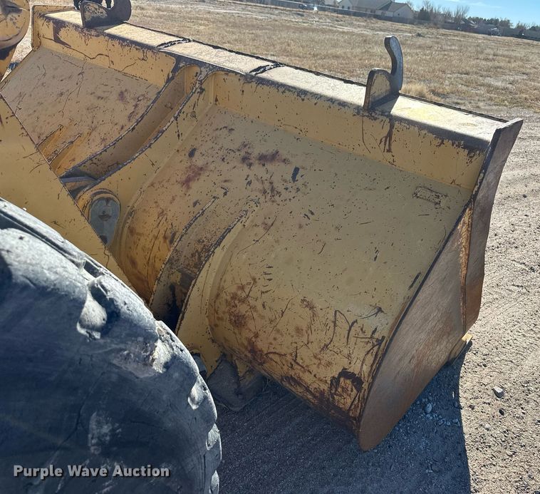 image for item DM2638 1999 John Deere 624H  wheel loader