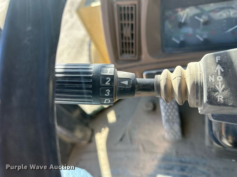 image for item DM2638 1999 John Deere 624H  wheel loader