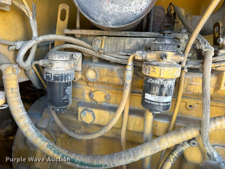 image for item DM2638 1999 John Deere 624H  wheel loader