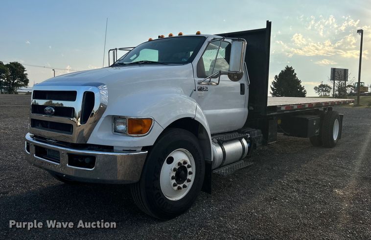 image for item KW9036 2015 Ford F750 Super Duty  dump flatbed truck