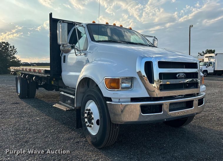 image for item KW9036 2015 Ford F750 Super Duty  dump flatbed truck