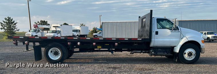 image for item KW9036 2015 Ford F750 Super Duty  dump flatbed truck