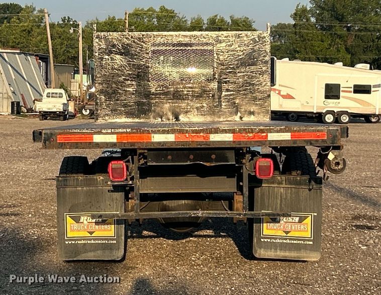 image for item KW9036 2015 Ford F750 Super Duty  dump flatbed truck