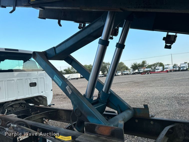 image for item KW9036 2015 Ford F750 Super Duty  dump flatbed truck