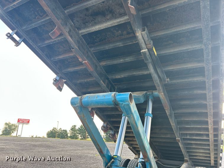 image for item KW9036 2015 Ford F750 Super Duty  dump flatbed truck