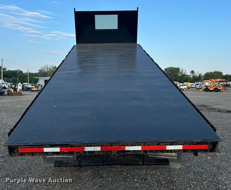 image for item KW9036 2015 Ford F750 Super Duty  dump flatbed truck