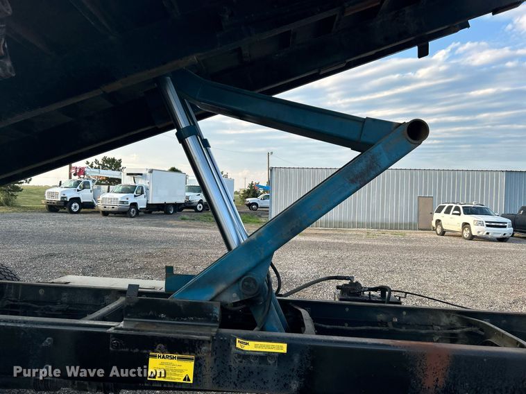 image for item KW9036 2015 Ford F750 Super Duty  dump flatbed truck
