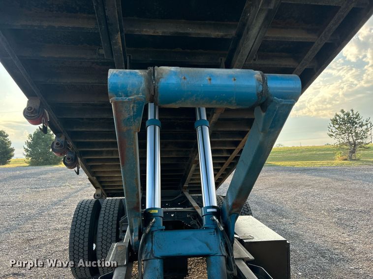 image for item KW9036 2015 Ford F750 Super Duty  dump flatbed truck