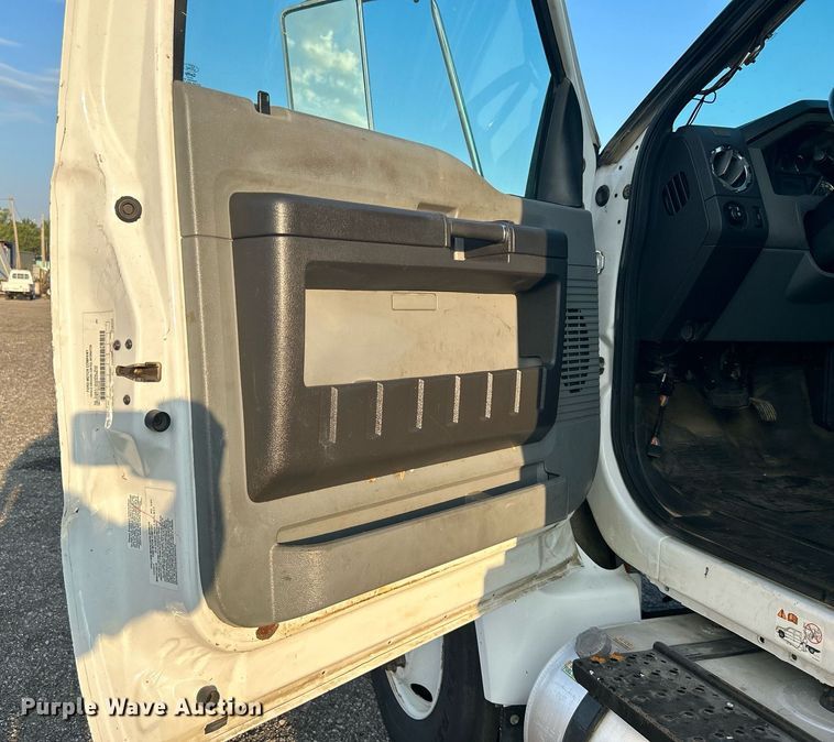 image for item KW9036 2015 Ford F750 Super Duty  dump flatbed truck