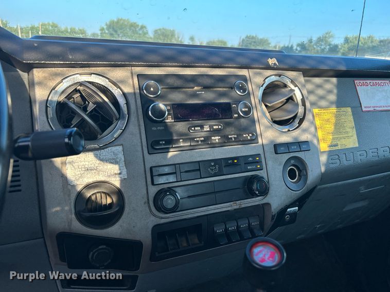 image for item KW9036 2015 Ford F750 Super Duty  dump flatbed truck