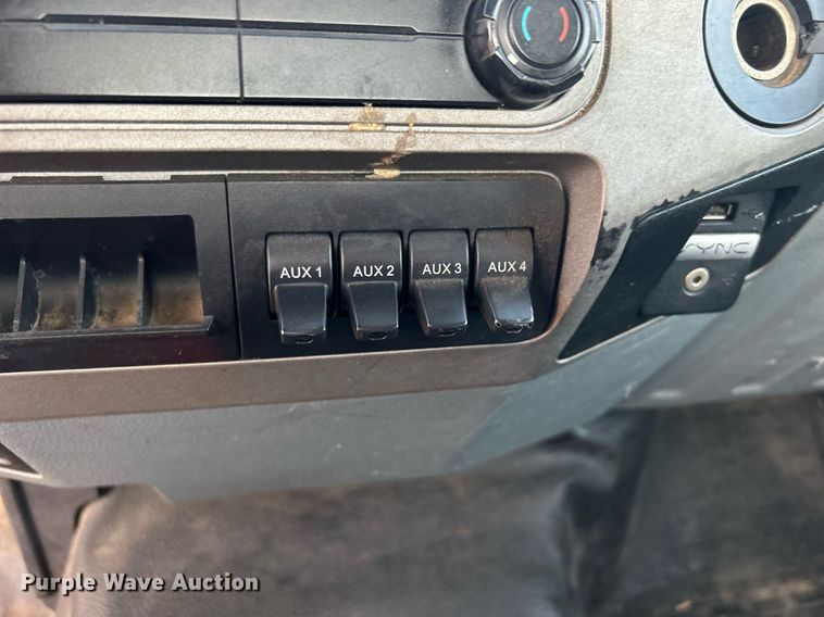 image for item KW9036 2015 Ford F750 Super Duty  dump flatbed truck