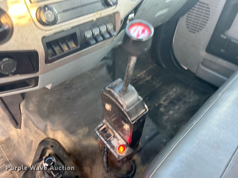 image for item KW9036 2015 Ford F750 Super Duty  dump flatbed truck