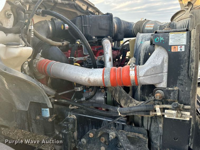 image for item KW9036 2015 Ford F750 Super Duty  dump flatbed truck