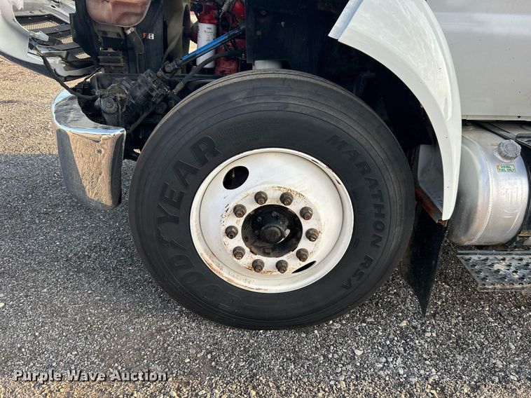 image for item KW9036 2015 Ford F750 Super Duty  dump flatbed truck