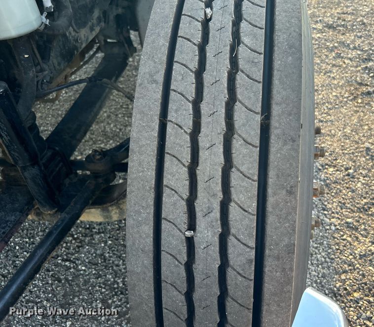 image for item KW9036 2015 Ford F750 Super Duty  dump flatbed truck