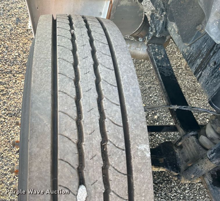 image for item KW9036 2015 Ford F750 Super Duty  dump flatbed truck