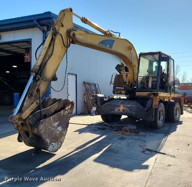 image for item LJ9357 2002 Caterpillar M315  wheeled excavator