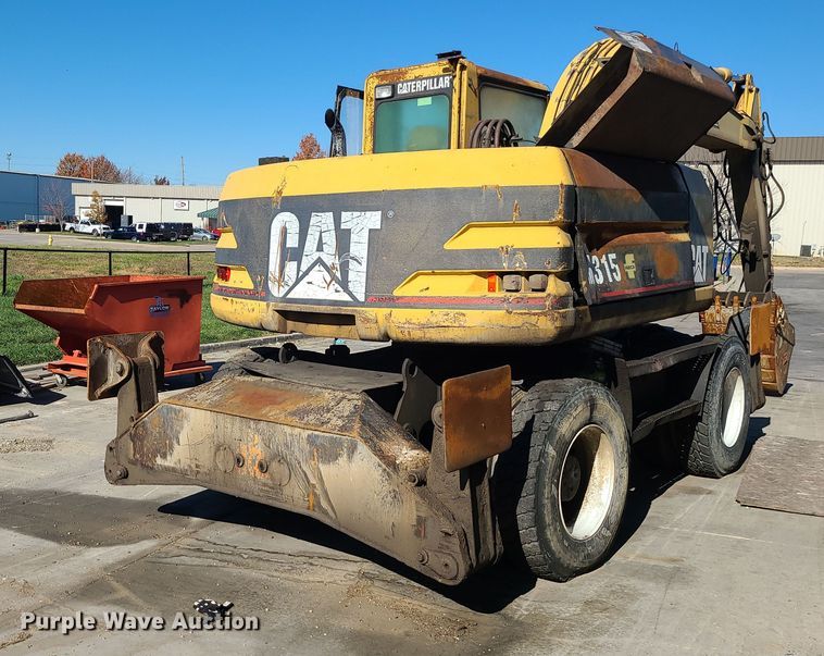 image for item LJ9357 2002 Caterpillar M315  wheeled excavator
