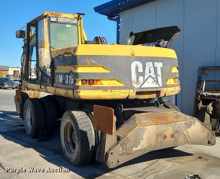 image for item LJ9357 2002 Caterpillar M315  wheeled excavator