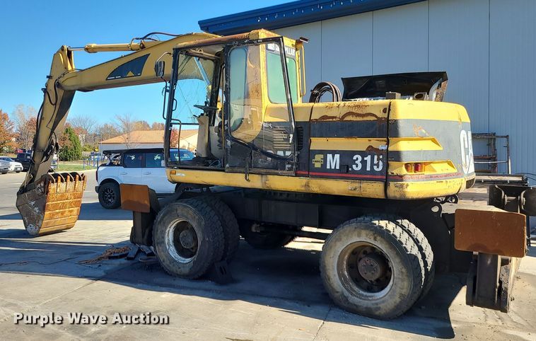 image for item LJ9357 2002 Caterpillar M315  wheeled excavator