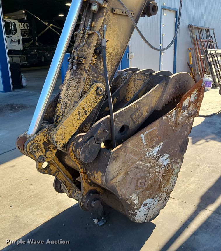 image for item LJ9357 2002 Caterpillar M315  wheeled excavator