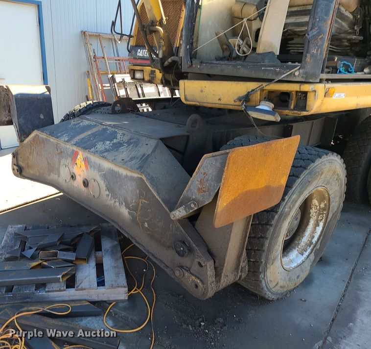 image for item LJ9357 2002 Caterpillar M315  wheeled excavator