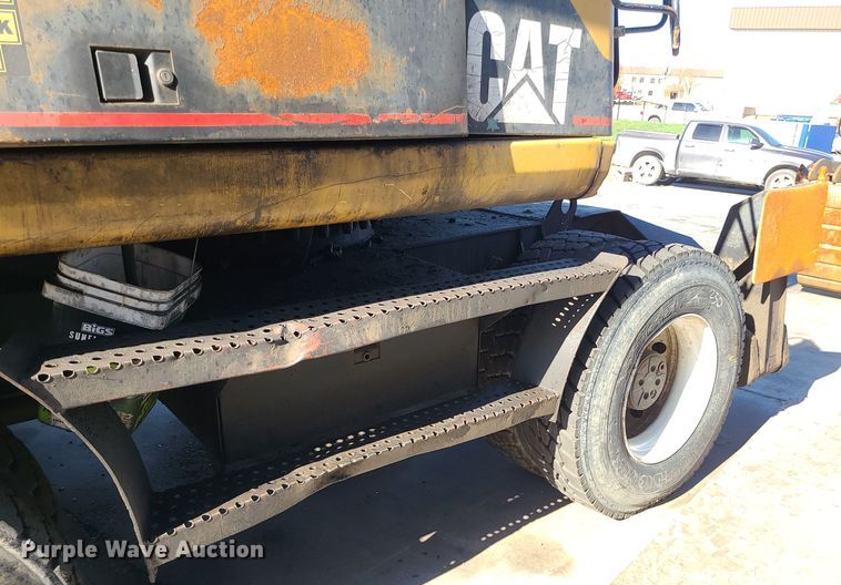 image for item LJ9357 2002 Caterpillar M315  wheeled excavator