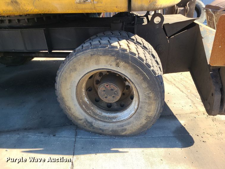 image for item LJ9357 2002 Caterpillar M315  wheeled excavator