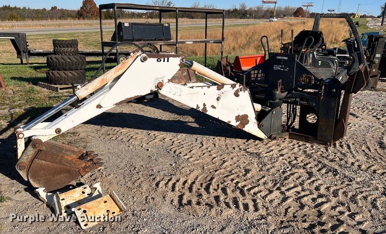 image for item NM9014 Melroe 811  skid steer backhoe