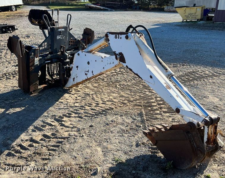 image for item NM9014 Melroe 811  skid steer backhoe