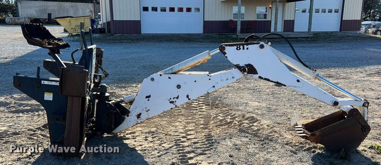 image for item NM9014 Melroe 811  skid steer backhoe
