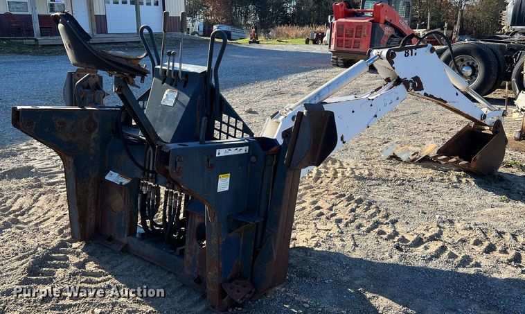 image for item NM9014 Melroe 811  skid steer backhoe