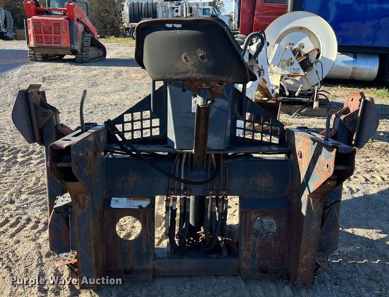 image for item NM9014 Melroe 811  skid steer backhoe