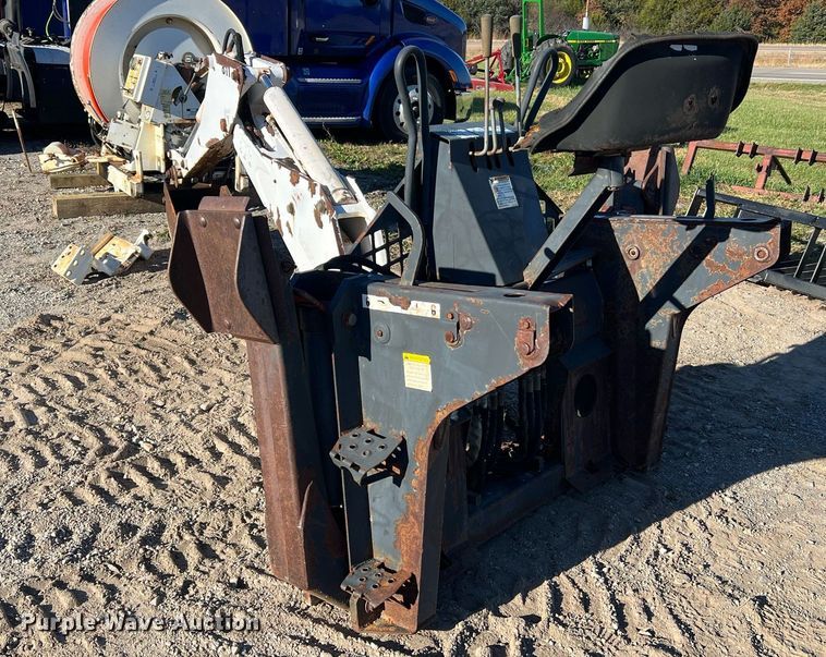 image for item NM9014 Melroe 811  skid steer backhoe