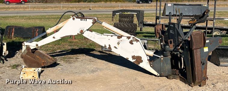 image for item NM9014 Melroe 811  skid steer backhoe