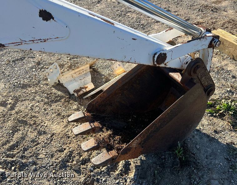 image for item NM9014 Melroe 811  skid steer backhoe