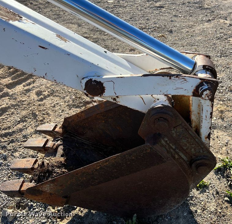 image for item NM9014 Melroe 811  skid steer backhoe