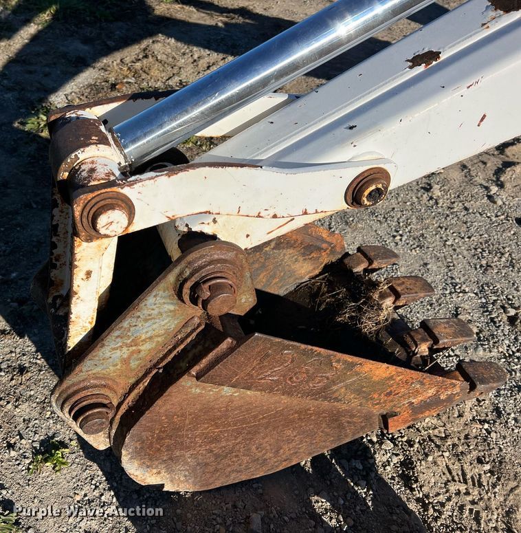 image for item NM9014 Melroe 811  skid steer backhoe