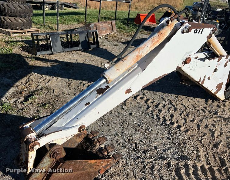 image for item NM9014 Melroe 811  skid steer backhoe