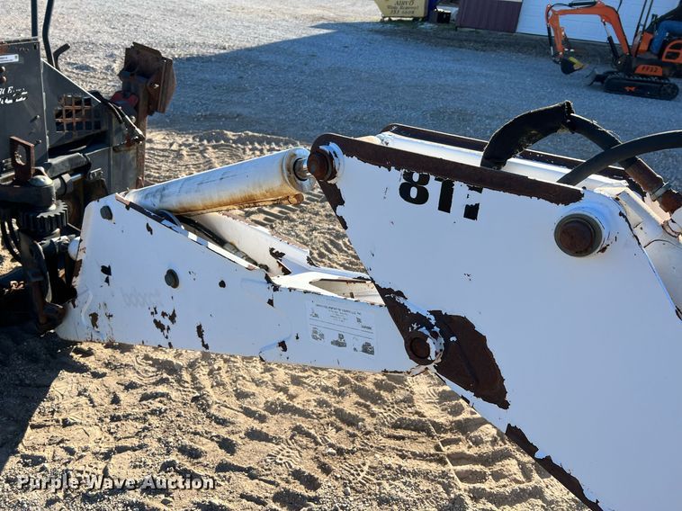 image for item NM9014 Melroe 811  skid steer backhoe