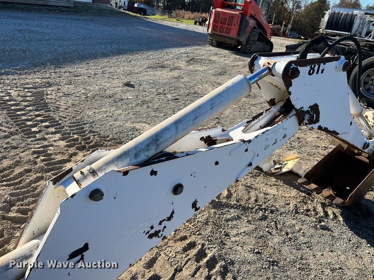 image for item NM9014 Melroe 811  skid steer backhoe