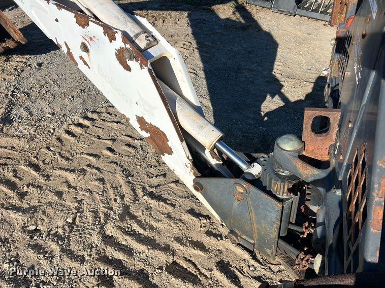 image for item NM9014 Melroe 811  skid steer backhoe