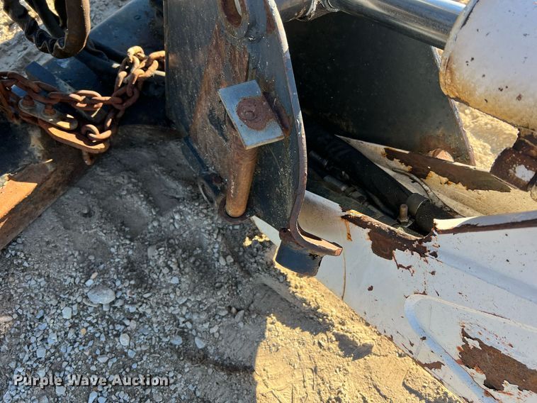 image for item NM9014 Melroe 811  skid steer backhoe