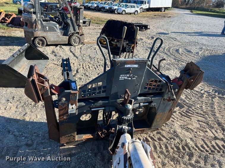 image for item NM9014 Melroe 811  skid steer backhoe