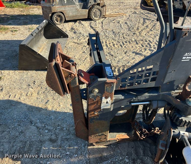 image for item NM9014 Melroe 811  skid steer backhoe