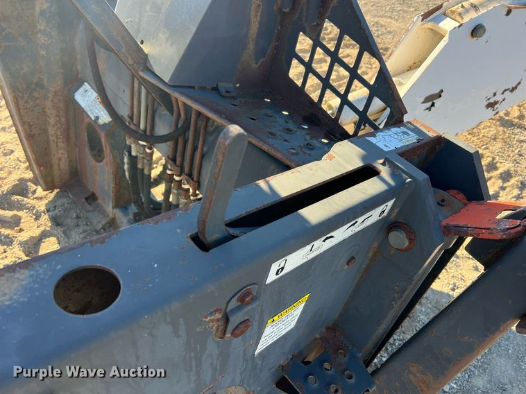 image for item NM9014 Melroe 811  skid steer backhoe