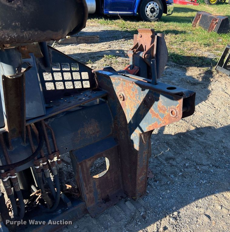 image for item NM9014 Melroe 811  skid steer backhoe