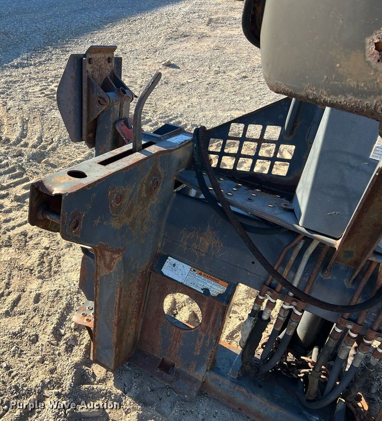 image for item NM9014 Melroe 811  skid steer backhoe