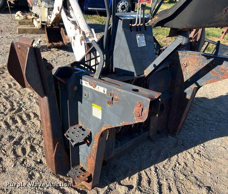 image for item NM9014 Melroe 811  skid steer backhoe