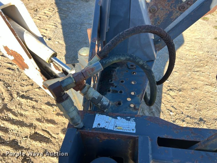 image for item NM9014 Melroe 811  skid steer backhoe